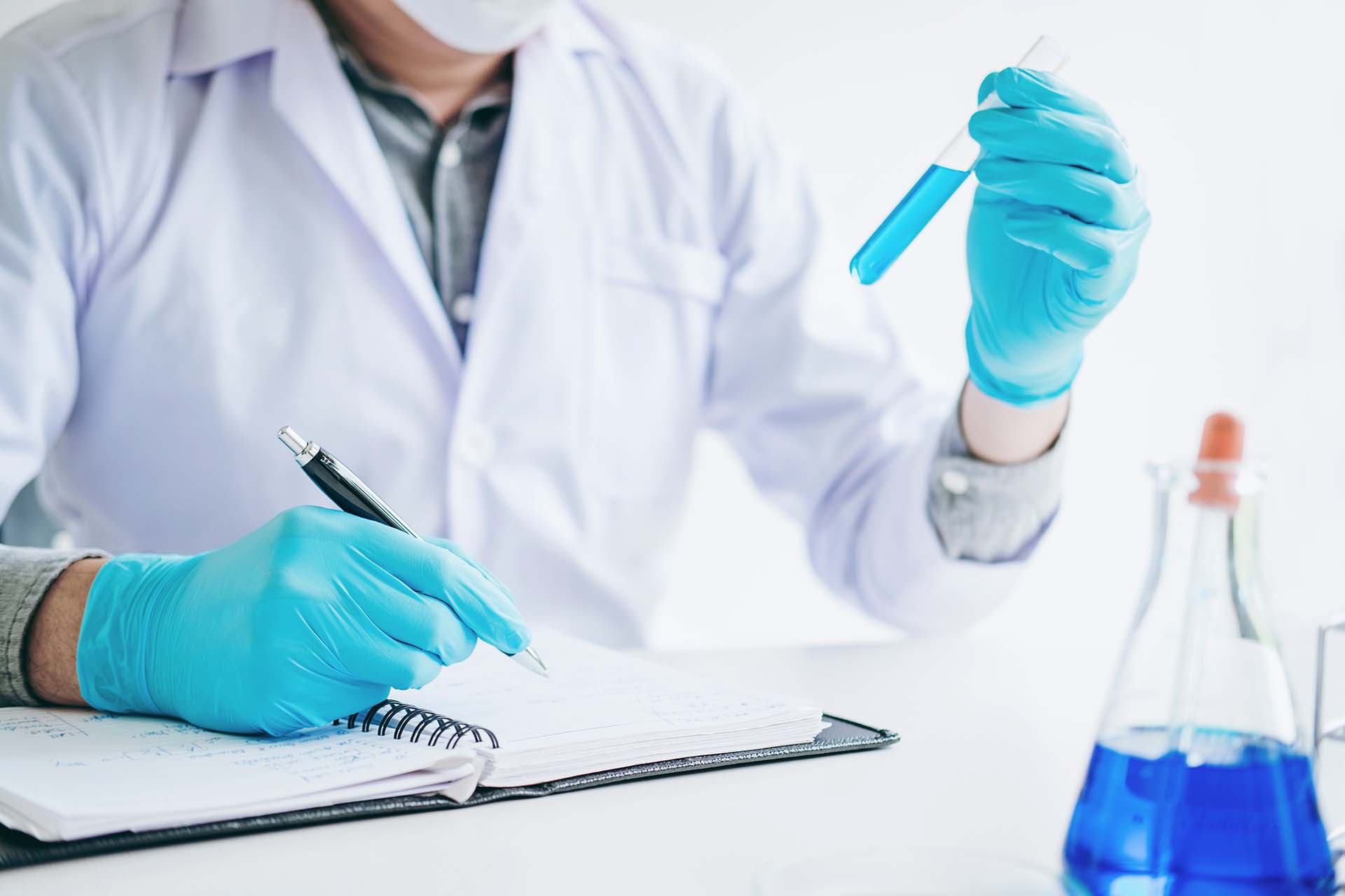 Scientist with equipment holding tools during scientific experiment science concept Scientist with equipment holding tools during scientific experiment science concept